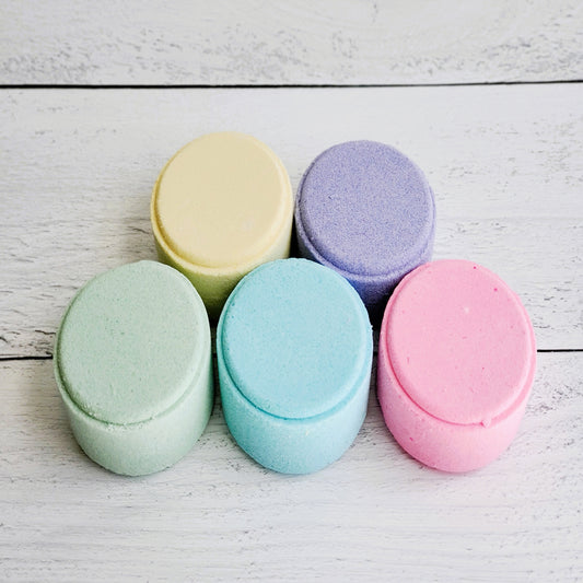 If you prefer a shower to a bath, shower steamers are a great option. They're made with the same skin-loving additives, just like bath bombs. But rather than placing them into a tub, the steamer is placed on the floor of the shower. The water activates the fizzing reaction and releases the essential oils into the air.